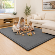 Children playing on the CloudOne play mat in Deep Grey