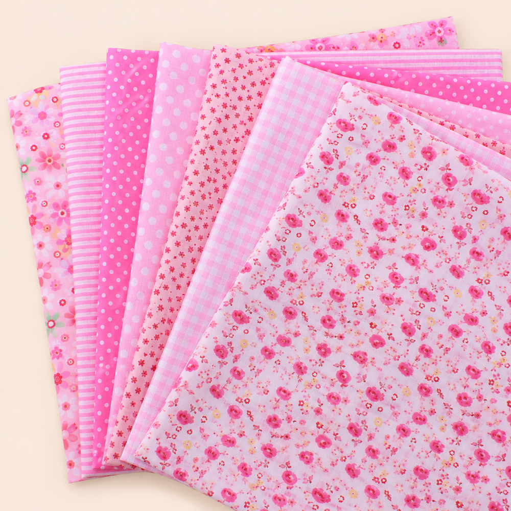 Pink 2 printed cotton squares showing the seven coordinating patterns