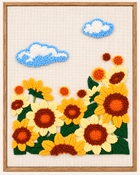 Sunflowers punch needle design in a wood-look frame — close-up front view