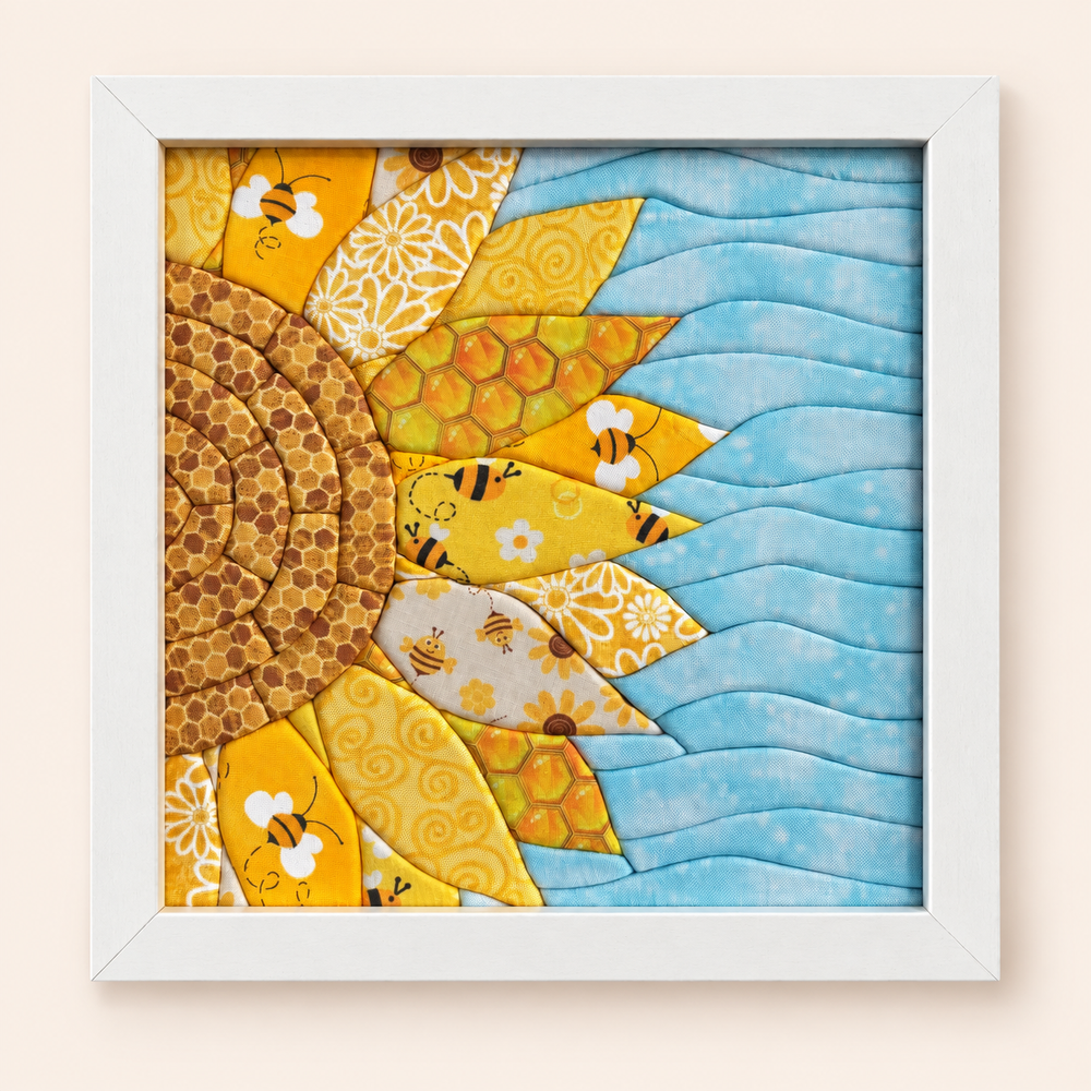 Sunflower fabric art in a wooden frame
