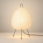 Japandi Paper Glow Table Lamp with white paper shade and black tripod legs