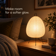 Paper table lamp illuminating a quiet evening corner